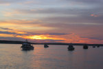 Boats anchored in the river.